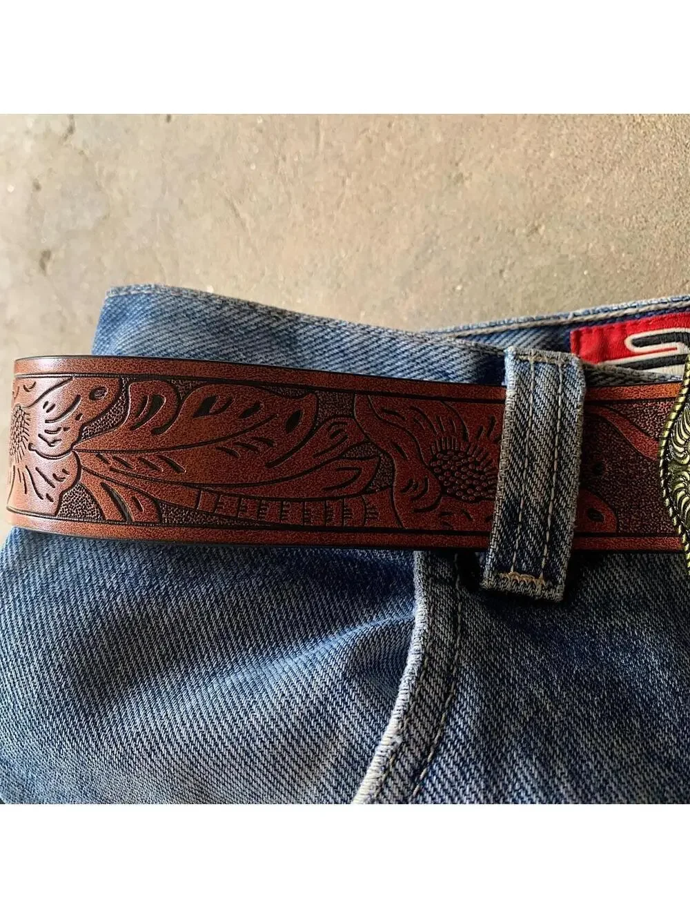 American Western Brown leather belt with silver-toned brass buckle, featuring a